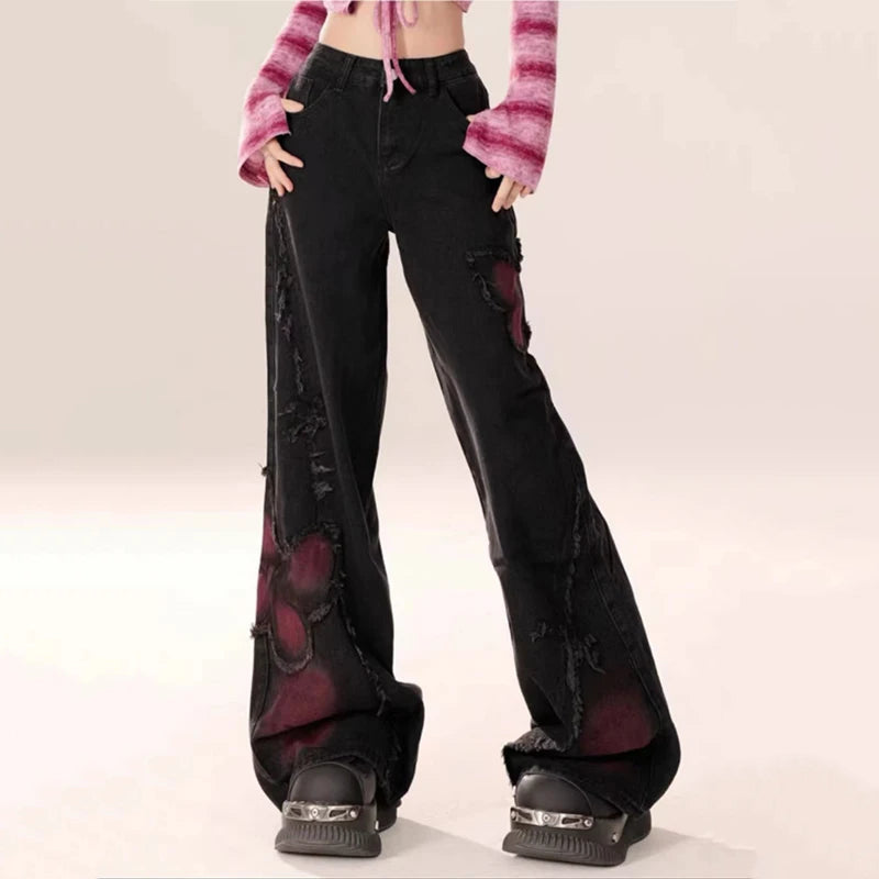Women’s black gothic baggy jeans — side and leg detail