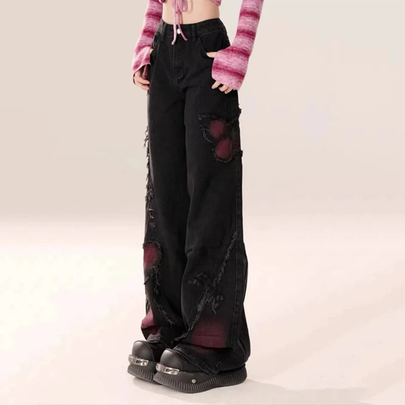 Women’s black gothic baggy jeans — full-length view